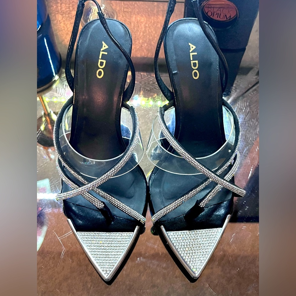 Aldo black with silver heels.